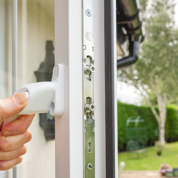 Person seen opening in a newly installed double glazed window on